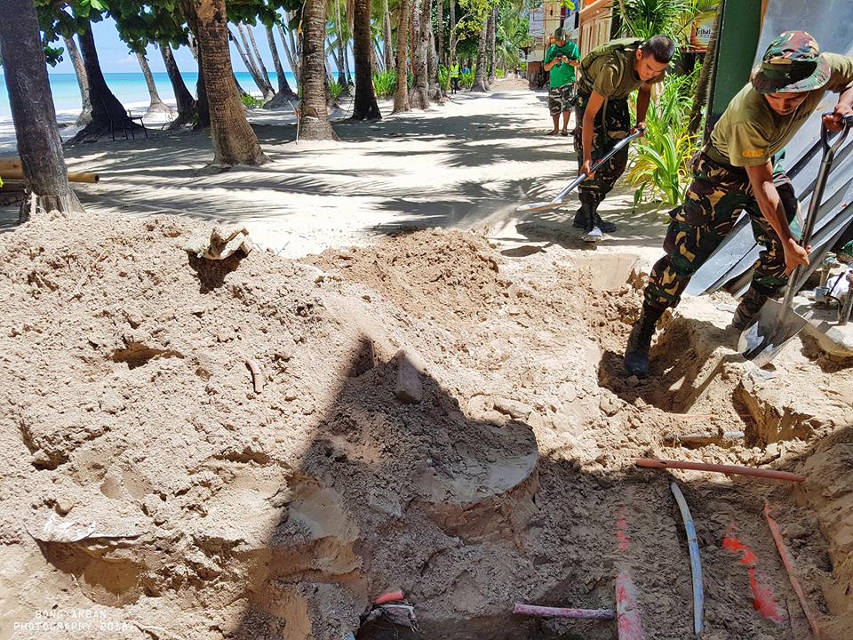 Week 5 of Boracay's closure sees the Army assisting with uncovering pipes taping in to a Government Drainage Pipe