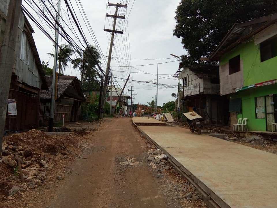 Ambulong, with half completed road surface