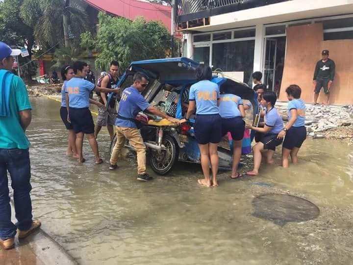 Inside Boracay: Week 11 Rescue of a trike that dropped in to a hole in the road, during the floods of July 11th. Photo Credit Energy Fm 107.7 Kalibo