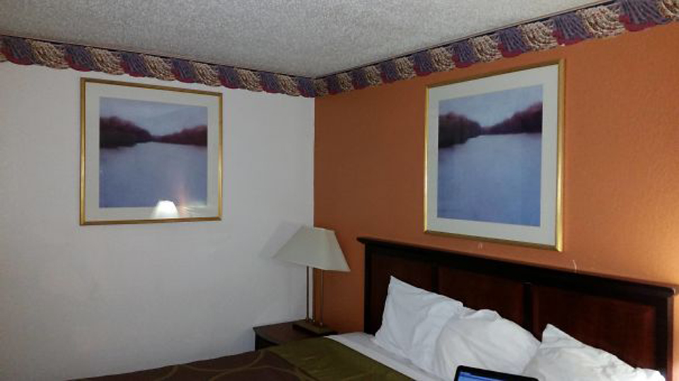 Hotel room with the same painting hung on both walls. Article Hotel Design Faults by MY RANGGO Hospitality Magazine