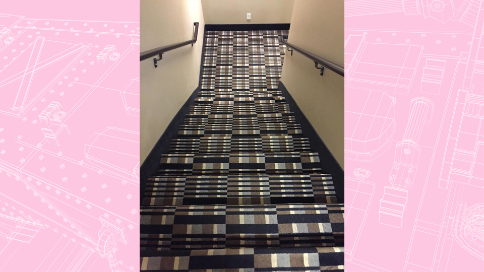 a geometric carpet on hotel stairs which creates the illusion of staggered steps. Article Hotel Design Faults by MY RANGGO Hospitality Magazine