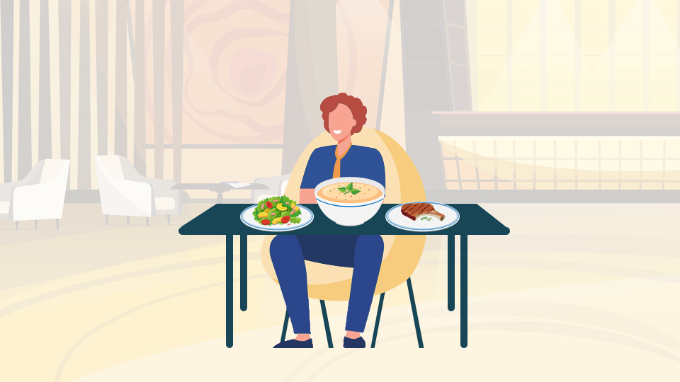 The Concierge sitting at a restaurant table with different food dishes in front of him. Article: The Concierge A Modern Day Superhero by MY RANGGO Hospitality Magazine Philippines