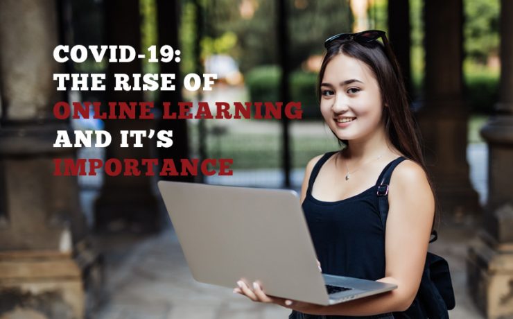 Image of a student with a laptop open