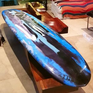custom made skwala surf board in a range of blue and black colours