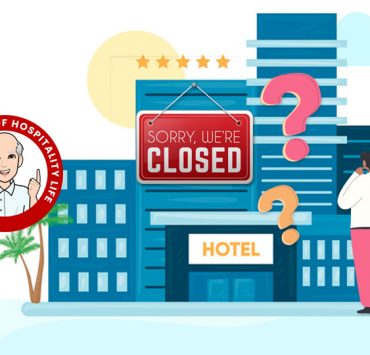 Person standing in front of a closed hotel wanting to work