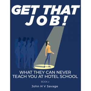 Front cover for eBook, Get That Job. 2nd in eBook Series of What They Can Never Teach You At Hotel School. Woman picked out by a spotlight in a crowd of people, Navy blue background with white text