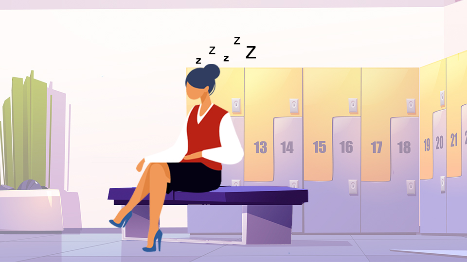 A woman asleep sitting upright in a locker room